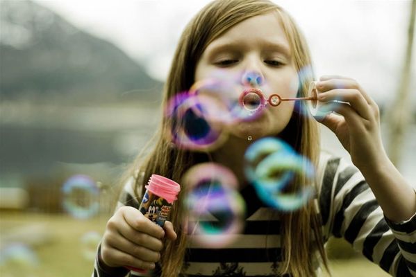 Girl Blowing Bubbles ~ Spiritual Bubble Bursting